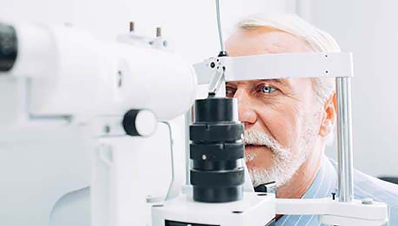 Dose Medicare cover glaucoma - senior man eye exam 800w.jpg