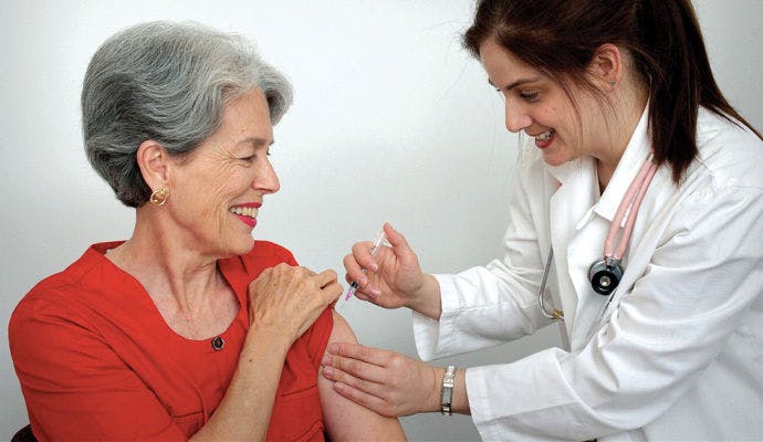 Medicare-flu-shot-injection-arm-senior-woman.jpg